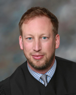 Portrait of Speaker Name